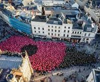 Aerial photo of the Human Poppy created in the centre of Cirencester